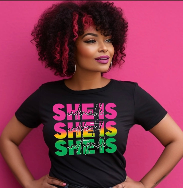 SHE IS